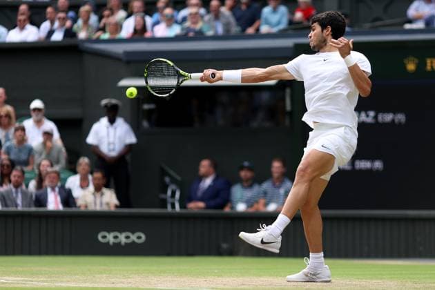 12th July 2023; All England Lawn Tennis and Croquet Club, London, England: Wimbledon Tennis Tournament; Carlos Alcaraz plays a forehand shot to Holger Rune  ActionPlus12530858 ShaunxBrooks