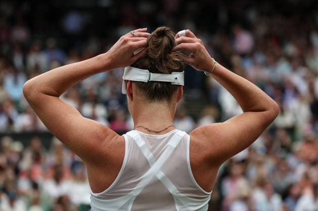 13th July 2023; All England Lawn Tennis and Croquet Club, London, England: Wimbledon Tennis Tournament; Elina Svitolina (UKR) adjusting her hair during the break in her match against Marketa Vondrousova (CZE)  ActionPlus12531068 JohnxPatrickxFletcher