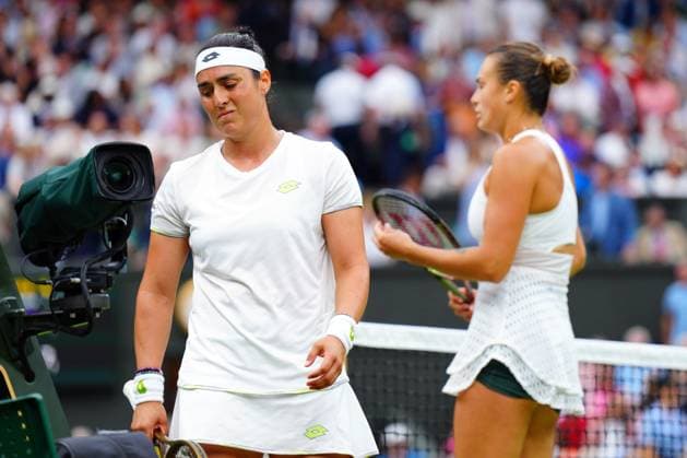 Mandatory Credit: Photo by Javier Garcia Shutterstock (14006845dc) Ons Jabeur reacts after losing the first set during her semi final match against Aryna Sabalenka Wimbledon Tennis Championships, Day 11, The All England Lawn Tennis and Croquet Club, London, UK - 13 Jul 2023 Wimbledon Tennis Championships, Day 11, The All England Lawn Tennis and Croquet Club, London, UK - 13 Jul 2023  Copyright: xJavierxGarcia Shutterstockx 14006845dc