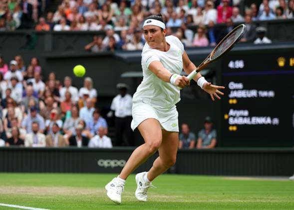 Mandatory Credit: Photo by Ella Ling Shutterstock (14006843dw) Ons Jabeur during her semi final match Wimbledon Tennis Championships, Day 11, The All England Lawn Tennis and Croquet Club, London, UK - 13 Jul 2023 Wimbledon Tennis Championships, Day 11, The All England Lawn Tennis and Croquet Club, London, UK - 13 Jul 2023  Copyright: xEllaxLing Shutterstockx 14006843dw