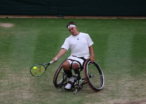 13th July 2023; All England Lawn Tennis and Croquet Club, London, England: Wimbledon Tennis Tournament; Martin De La Puente (ESP) with a forehand shot to Alfie Hewett (GBR) mens doubles wheelchair semi-final  ActionPlus12531135 JohnxPatrickxFletcher