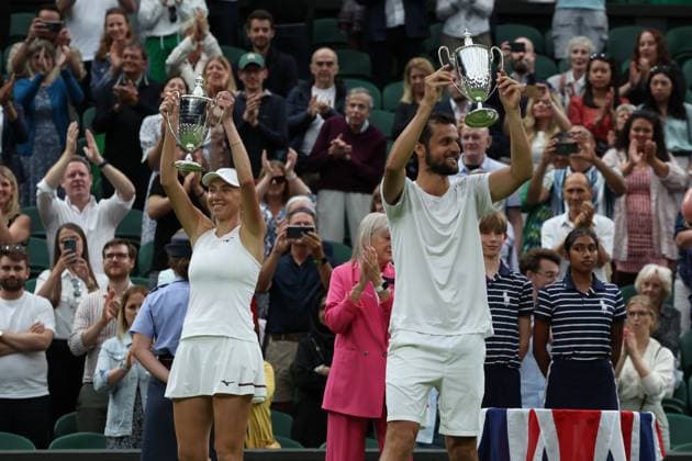 13th July 2023; All England Lawn Tennis and Croquet Club, London, England: Wimbledon Tennis Tournament; Lyudmyla& xa0;Kichenok (UKR) and Mate& xa0;Pavic (CRO) lift the Mixed Doubles Trophy after defeating Joran& xa0;Vliegen (BEL) and Yifan& xa0;Xu (CHN)  ActionPlus12531146 JohnxPatrickxFletcher