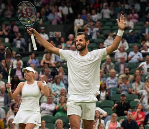 Tennis - 2023 Wimbledon Championships - Week Two - Day Eleven - All England lawn Tennis & Racquet Club, Wimbledon - Thursday 13th Mixed Doubles final Mate Pavings (CRO) and Lyudmyia Kirchenok (UKR) V Joran Vliegen (BEL) v Yifan Xu (CHN) Mate Pavings (CRO) celebrates after winning match point 