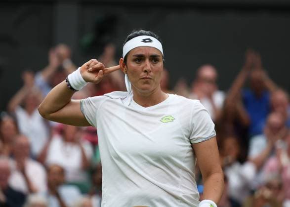 13th July 2023; All England Lawn Tennis and Croquet Club, London, England: Wimbledon Tennis Tournament; Ons Jabeur (TUN) celebrates with the spectators in her match against Aryna Sabalenka (BLR)  ActionPlus12531170 JohnxPatrickxFletcher