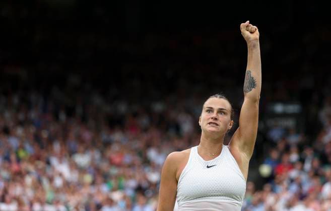 (230714) -- LONDON, July 14, 2023 -- Aryna Sabalenka reacts during the women s singles semifinal between Ons Jabeur of Tunisia and Aryna Sabalenka of Belarus at Wimbledon tennis championship in London, Britain, on July 13, 2023. ) (SP) BRITAIN-LONDON-TENNIS-WIMBLEDON-DAY 11 HanxYan 