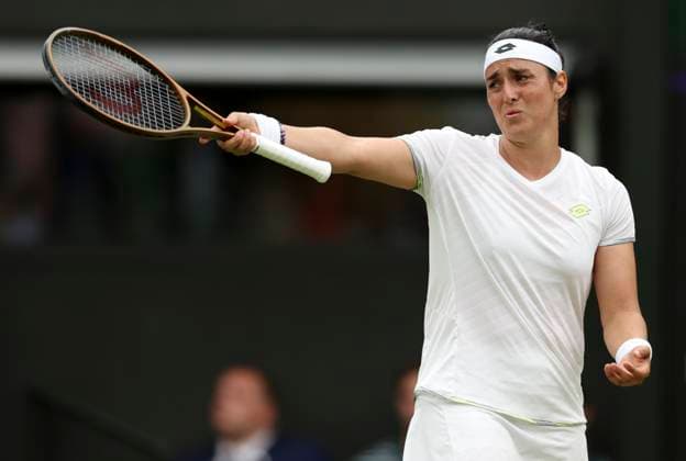 (230714) -- LONDON, July 14, 2023 -- Ons Jabeur reacts during the women s singles semifinal between Ons Jabeur of Tunisia and Aryna Sabalenka of Belarus at Wimbledon tennis championship in London, Britain, on July 13, 2023. ) (SP) BRITAIN-LONDON-TENNIS-WIMBLEDON-DAY 11 HanxYan 