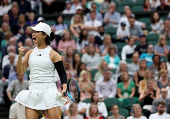 (230714) -- LONDON, July 14, 2023 -- Xu Yifan reacts during the mixed doubles final match between Xu Yifan of China Joran Vliegen of Belgium and Mate Pavic of Croatia Lyudmyla Kichenok of Ukraine at Wimbledon tennis Championship in London, Britain, on July 13, 2023. ) (SP)BRITAIN-LONDON-TENNIS-WIMBLEDON-DAY 11 LixYing 