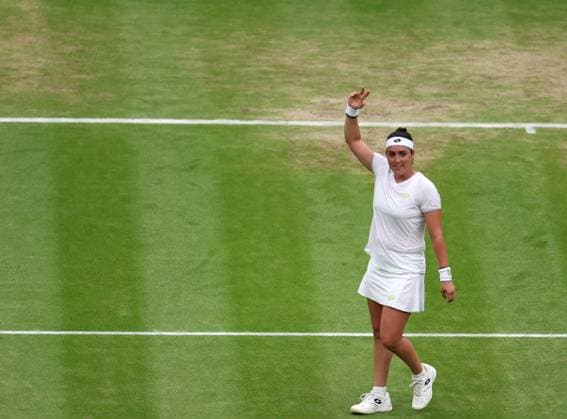 (230714) -- LONDON, July 14, 2023 -- Ons Jabeur celebrates after the women s singles semifinal between Ons Jabeur of Tunisia and Aryna Sabalenka of Belarus at Wimbledon tennis championship in London, Britain, on July 13, 2023. ) (SP) BRITAIN-LONDON-TENNIS-WIMBLEDON-DAY 11 LixYing 