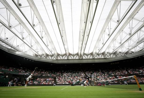(230714) -- LONDON, July 14, 2023 -- Xu Yifan (R) Joran Vliegen compete during the mixed doubles final match between Xu Yifan of China Joran Vliegen of Belgium and Mate Pavic of Croatia Lyudmyla Kichenok of Ukraine at Wimbledon tennis Championship in London, Britain, on July 13, 2023. ) (SP)BRITAIN-LONDON-TENNIS-WIMBLEDON-DAY 11 LixYing 
