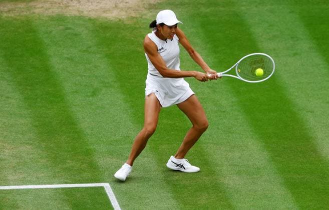 Mandatory Credit: Photo by Kieran McManus Shutterstock (14009604a) Shuai Zhang of China in action during her Ladies Doubles Semi Final match. Wimbledon Tennis Championships, Day 12, The All England Lawn Tennis and Croquet Club, London, UK - 14 Jul 2023 Wimbledon Tennis Championships, Day 12, The All England Lawn Tennis and Croquet Club, London, UK - 14 Jul 2023  Copyright: xKieranxMcManus Shutterstockx 14009604a
