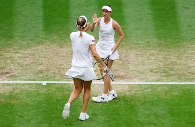 Mandatory Credit: Photo by Kieran McManus Shutterstock (14009604c) Storm Hunter of Australia and Elise Mertens of Belgium during their Ladies Doubles Semi Final match. Wimbledon Tennis Championships, Day 12, The All England Lawn Tennis and Croquet Club, London, UK - 14 Jul 2023 Wimbledon Tennis Championships, Day 12, The All England Lawn Tennis and Croquet Club, London, UK - 14 Jul 2023  Copyright: xKieranxMcManus Shutterstockx 14009604c