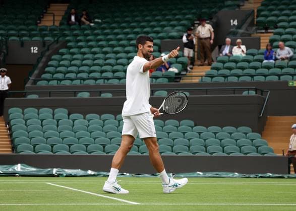14th July 2023; All England Lawn Tennis and Croquet Club, London, England: Wimbledon Tennis Tournament; Novak Djokovic (GBR) giving the thumps to Jannik Sinner (ITA) before practising on Court One in the morning before his semi final against Jannik Sinner (ITA)  ActionPlus12531189 JohnxPatrickxFletcher