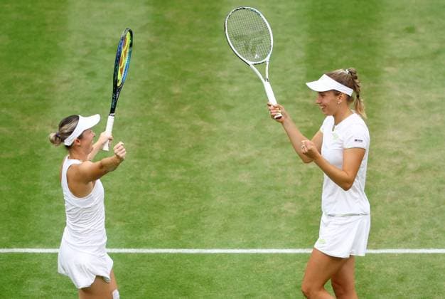 Mandatory Credit: Photo by Kieran McManus Shutterstock (14009604x) Elise Mertens of Belgium and Storm Hunter of Australia celebrate winning their Ladies Doubles Semi Final match. Wimbledon Tennis Championships, Day 12, The All England Lawn Tennis and Croquet Club, London, UK - 14 Jul 2023 Wimbledon Tennis Championships, Day 12, The All England Lawn Tennis and Croquet Club, London, UK - 14 Jul 2023  Copyright: xKieranxMcManus Shutterstockx 14009604x