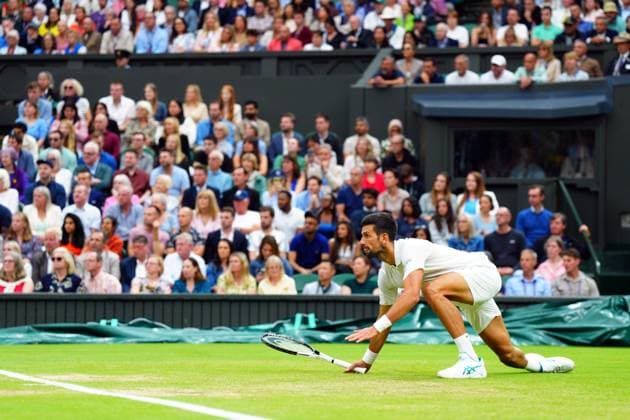 Mandatory Credit: Photo by Javier Garcia Shutterstock (14009601bg) Novak Djokovic during his semi final match Wimbledon Tennis Championships, Day 12, The All England Lawn Tennis and Croquet Club, London, UK - 14 Jul 2023 Wimbledon Tennis Championships, Day 12, The All England Lawn Tennis and Croquet Club, London, UK - 14 Jul 2023  Copyright: xJavierxGarcia Shutterstockx 14009601bg