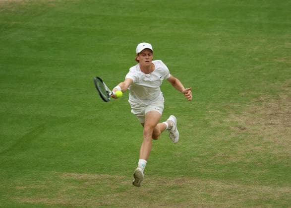 14th July 2023; All England Lawn Tennis and Croquet Club, London, England: Wimbledon Tennis Tournament; Jannik Sinner (ITA) with a forehand shot to Novak Djokovic (GBR)  ActionPlus12531212 JohnxPatrickxFletcher