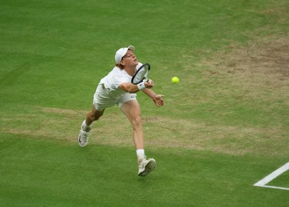14th July 2023; All England Lawn Tennis and Croquet Club, London, England: Wimbledon Tennis Tournament; Jannik Sinner (ITA) with a forehand shot to Novak Djokovic (SRB)  ActionPlus12531225 JohnxPatrickxFletcher