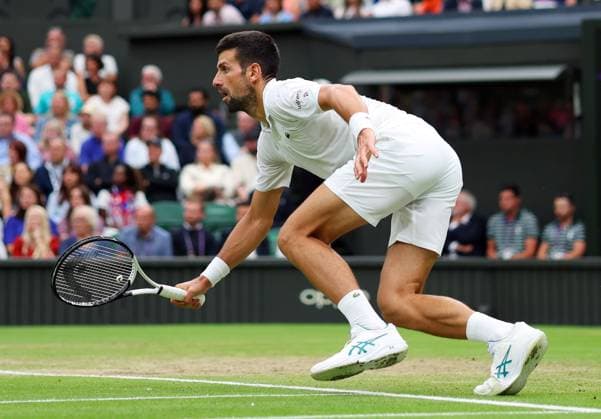Mandatory Credit: Photo by Ella Ling Shutterstock (14009603au) Novak Djokovic during his semi final match Wimbledon Tennis Championships, Day 12, The All England Lawn Tennis and Croquet Club, London, UK - 14 Jul 2023 Wimbledon Tennis Championships, Day 12, The All England Lawn Tennis and Croquet Club, London, UK - 14 Jul 2023  Copyright: xEllaxLing Shutterstockx 14009603au