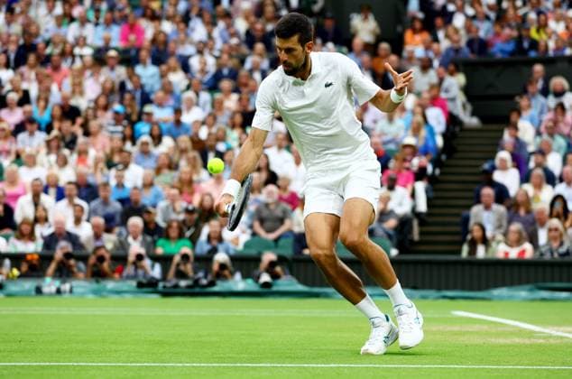 Mandatory Credit: Photo by Kieran McManus Shutterstock (14009604ak) Novak Djokovic of Serbia during his Semi Final Match. Wimbledon Tennis Championships, Day 12, The All England Lawn Tennis and Croquet Club, London, UK - 14 Jul 2023 Wimbledon Tennis Championships, Day 12, The All England Lawn Tennis and Croquet Club, London, UK - 14 Jul 2023  Copyright: xKieranxMcManus Shutterstockx 14009604ak