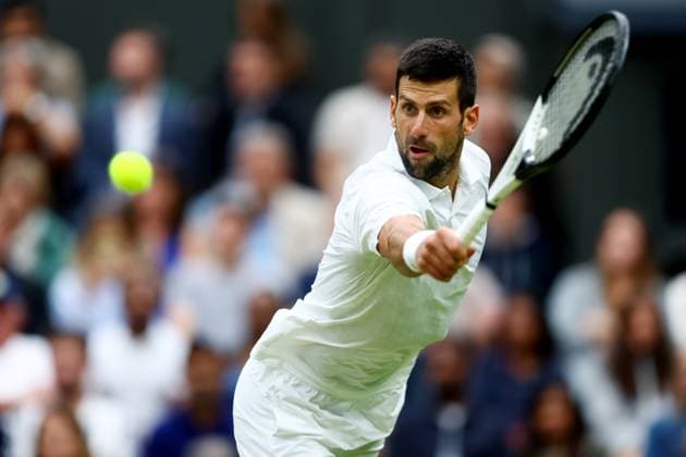 Mandatory Credit: Photo by Kieran McManus Shutterstock (14009604aq) Novak Djokovic of Serbia in action during his Semi Final Match. Wimbledon Tennis Championships, Day 12, The All England Lawn Tennis and Croquet Club, London, UK - 14 Jul 2023 Wimbledon Tennis Championships, Day 12, The All England Lawn Tennis and Croquet Club, London, UK - 14 Jul 2023  Copyright: xKieranxMcManus Shutterstockx 14009604aq