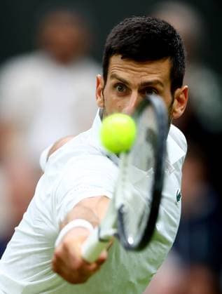 Mandatory Credit: Photo by Kieran McManus Shutterstock (14009604al) Novak Djokovic of Serbia in action during his Semi Final Match. Wimbledon Tennis Championships, Day 12, The All England Lawn Tennis and Croquet Club, London, UK - 14 Jul 2023 Wimbledon Tennis Championships, Day 12, The All England Lawn Tennis and Croquet Club, London, UK - 14 Jul 2023  Copyright: xKieranxMcManus Shutterstockx 14009604al