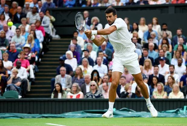 Mandatory Credit: Photo by Kieran McManus Shutterstock (14009604bc) Novak Djokovic of Serbia in action during his Semi Final match. Wimbledon Tennis Championships, Day 12, The All England Lawn Tennis and Croquet Club, London, UK - 14 Jul 2023 Wimbledon Tennis Championships, Day 12, The All England Lawn Tennis and Croquet Club, London, UK - 14 Jul 2023  Copyright: xKieranxMcManus Shutterstockx 14009604bc