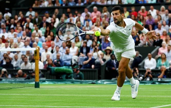 Mandatory Credit: Photo by Kieran McManus Shutterstock (14009604ax) Novak Djokovic of Serbia in action during his Semi Final match. Wimbledon Tennis Championships, Day 12, The All England Lawn Tennis and Croquet Club, London, UK - 14 Jul 2023 Wimbledon Tennis Championships, Day 12, The All England Lawn Tennis and Croquet Club, London, UK - 14 Jul 2023  Copyright: xKieranxMcManus Shutterstockx 14009604ax