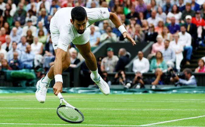Mandatory Credit: Photo by Kieran McManus Shutterstock (14009604ay) Novak Djokovic of Serbia in action during his Semi Final match. Wimbledon Tennis Championships, Day 12, The All England Lawn Tennis and Croquet Club, London, UK - 14 Jul 2023 Wimbledon Tennis Championships, Day 12, The All England Lawn Tennis and Croquet Club, London, UK - 14 Jul 2023  Copyright: xKieranxMcManus Shutterstockx 14009604ay