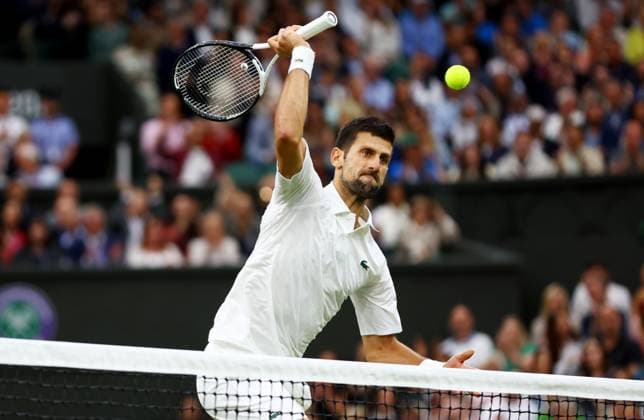 Mandatory Credit: Photo by Kieran McManus Shutterstock (14009604ce) Novak Djokovic of Serbia during his Semi Final Match. Wimbledon Tennis Championships, Day 12, The All England Lawn Tennis and Croquet Club, London, UK - 14 Jul 2023 Wimbledon Tennis Championships, Day 12, The All England Lawn Tennis and Croquet Club, London, UK - 14 Jul 2023  Copyright: xKieranxMcManus Shutterstockx 14009604ce