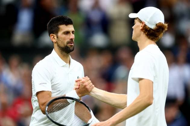 Mandatory Credit: Photo by Kieran McManus Shutterstock (14009604cr) Novak Djokovic of Serbia and Jannik Sinner of Italy shake hands after their match. Wimbledon Tennis Championships, Day 12, The All England Lawn Tennis and Croquet Club, London, UK - 14 Jul 2023 Wimbledon Tennis Championships, Day 12, The All England Lawn Tennis and Croquet Club, London, UK - 14 Jul 2023  Copyright: xKieranxMcManus Shutterstockx 14009604cr