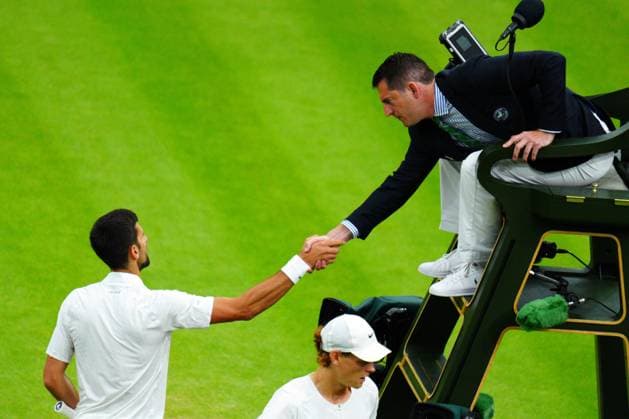 Mandatory Credit: Photo by Javier Garcia Shutterstock (14009601db) Novak Djokovic celebrates victory in his semi final match and shakes hands with the umpire Wimbledon Tennis Championships, Day 12, The All England Lawn Tennis and Croquet Club, London, UK - 14 Jul 2023 Wimbledon Tennis Championships, Day 12, The All England Lawn Tennis and Croquet Club, London, UK - 14 Jul 2023  Copyright: xJavierxGarcia Shutterstockx 14009601db