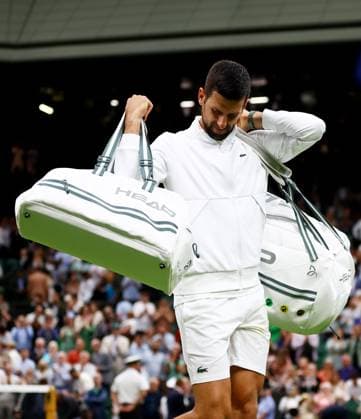 Mandatory Credit: Photo by Kieran McManus Shutterstock (14009604cs) Novak Djokovic of Serbia leaves the court after winning his Semi Final match. Wimbledon Tennis Championships, Day 12, The All England Lawn Tennis and Croquet Club, London, UK - 14 Jul 2023 Wimbledon Tennis Championships, Day 12, The All England Lawn Tennis and Croquet Club, London, UK - 14 Jul 2023  Copyright: xKieranxMcManus Shutterstockx 14009604cs