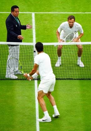Mandatory Credit: Photo by Javier Garcia Shutterstock (14009601dh) Carlos Alcaraz and Daniil Medvedev take part in the coin-toss ahead of their semi final match Wimbledon Tennis Championships, Day 12, The All England Lawn Tennis and Croquet Club, London, UK - 14 Jul 2023 Wimbledon Tennis Championships, Day 12, The All England Lawn Tennis and Croquet Club, London, UK - 14 Jul 2023  Copyright: xJavierxGarcia Shutterstockx 14009601dh