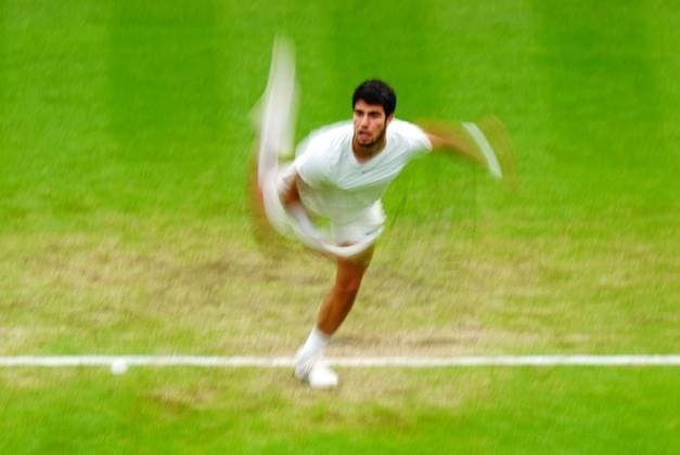 Mandatory Credit: Photo by Javier Garcia Shutterstock (14009601dk) Carlos Alcaraz during his semi final match Wimbledon Tennis Championships, Day 12, The All England Lawn Tennis and Croquet Club, London, UK - 14 Jul 2023 Wimbledon Tennis Championships, Day 12, The All England Lawn Tennis and Croquet Club, London, UK - 14 Jul 2023  Copyright: xJavierxGarcia Shutterstockx 14009601dk