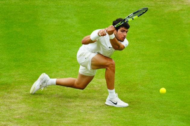 Mandatory Credit: Photo by Javier Garcia Shutterstock (14009601dw) Carlos Alcaraz during his semi final match Wimbledon Tennis Championships, Day 12, The All England Lawn Tennis and Croquet Club, London, UK - 14 Jul 2023 Wimbledon Tennis Championships, Day 12, The All England Lawn Tennis and Croquet Club, London, UK - 14 Jul 2023  Copyright: xJavierxGarcia Shutterstockx 14009601dw