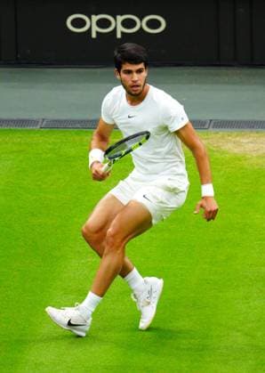 Mandatory Credit: Photo by Javier Garcia Shutterstock (14009601dy) Carlos Alcaraz during his semi final match Wimbledon Tennis Championships, Day 12, The All England Lawn Tennis and Croquet Club, London, UK - 14 Jul 2023 Wimbledon Tennis Championships, Day 12, The All England Lawn Tennis and Croquet Club, London, UK - 14 Jul 2023  Copyright: xJavierxGarcia Shutterstockx 14009601dy