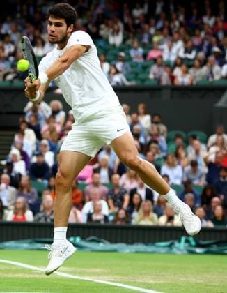 Mandatory Credit: Photo by Kieran McManus Shutterstock (14009604dr) Carlos Alcaraz of Spain in action during his Semi Final match. Wimbledon Tennis Championships, Day 12, The All England Lawn Tennis and Croquet Club, London, UK - 14 Jul 2023 Wimbledon Tennis Championships, Day 12, The All England Lawn Tennis and Croquet Club, London, UK - 14 Jul 2023  Copyright: xKieranxMcManus Shutterstockx 14009604dr