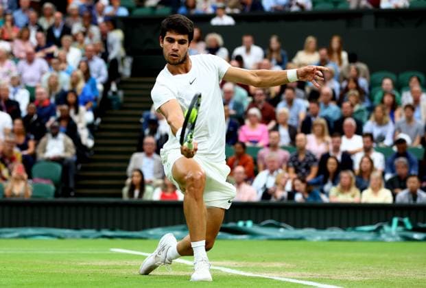Mandatory Credit: Photo by Kieran McManus Shutterstock (14009604dw) Carlos Alcaraz of Spain in action during his Semi Final match. Wimbledon Tennis Championships, Day 12, The All England Lawn Tennis and Croquet Club, London, UK - 14 Jul 2023 Wimbledon Tennis Championships, Day 12, The All England Lawn Tennis and Croquet Club, London, UK - 14 Jul 2023  Copyright: xKieranxMcManus Shutterstockx 14009604dw