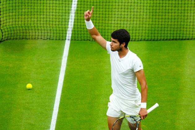 Mandatory Credit: Photo by Javier Garcia Shutterstock (14009601eo) Carlos Alcaraz celebrates during his semi final match Wimbledon Tennis Championships, Day 12, The All England Lawn Tennis and Croquet Club, London, UK - 14 Jul 2023 Wimbledon Tennis Championships, Day 12, The All England Lawn Tennis and Croquet Club, London, UK - 14 Jul 2023  Copyright: xJavierxGarcia Shutterstockx 14009601eo