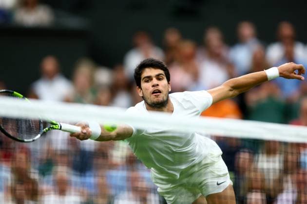 Mandatory Credit: Photo by Kieran McManus Shutterstock (14009604ei) Carlos Alcaraz of Spain during his Semi Final match. Wimbledon Tennis Championships, Day 12, The All England Lawn Tennis and Croquet Club, London, UK - 14 Jul 2023 Wimbledon Tennis Championships, Day 12, The All England Lawn Tennis and Croquet Club, London, UK - 14 Jul 2023  Copyright: xKieranxMcManus Shutterstockx 14009604ei