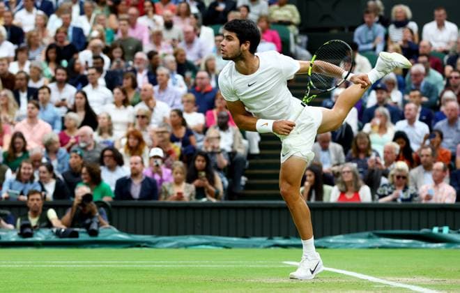 Mandatory Credit: Photo by Kieran McManus Shutterstock (14009604ej) Carlos Alcaraz of Spain in action during his Semi Final match. Wimbledon Tennis Championships, Day 12, The All England Lawn Tennis and Croquet Club, London, UK - 14 Jul 2023 Wimbledon Tennis Championships, Day 12, The All England Lawn Tennis and Croquet Club, London, UK - 14 Jul 2023  Copyright: xKieranxMcManus Shutterstockx 14009604ej