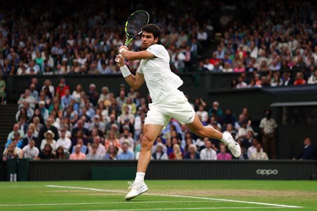 Mandatory Credit: Photo by Ella Ling Shutterstock (14009603dz) Carlos Alcaraz during his semi final match Wimbledon Tennis Championships, Day 12, The All England Lawn Tennis and Croquet Club, London, UK - 14 Jul 2023 Wimbledon Tennis Championships, Day 12, The All England Lawn Tennis and Croquet Club, London, UK - 14 Jul 2023  Copyright: xEllaxLing Shutterstockx 14009603dz