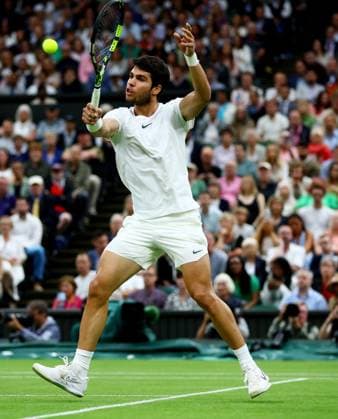 Mandatory Credit: Photo by Kieran McManus Shutterstock (14009604er) Carlos Alcaraz of Spain in action during his Semi Final match. Wimbledon Tennis Championships, Day 12, The All England Lawn Tennis and Croquet Club, London, UK - 14 Jul 2023 Wimbledon Tennis Championships, Day 12, The All England Lawn Tennis and Croquet Club, London, UK - 14 Jul 2023  Copyright: xKieranxMcManus Shutterstockx 14009604er