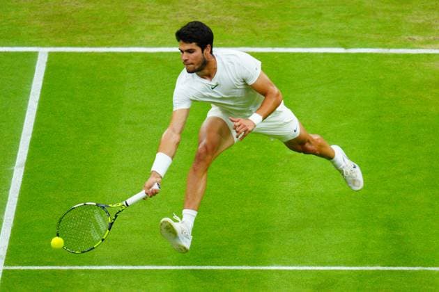 Mandatory Credit: Photo by Javier Garcia Shutterstock (14009601fg) Carlos Alcaraz during his semi final match Wimbledon Tennis Championships, Day 12, The All England Lawn Tennis and Croquet Club, London, UK - 14 Jul 2023 Wimbledon Tennis Championships, Day 12, The All England Lawn Tennis and Croquet Club, London, UK - 14 Jul 2023  Copyright: xJavierxGarcia Shutterstockx 14009601fg