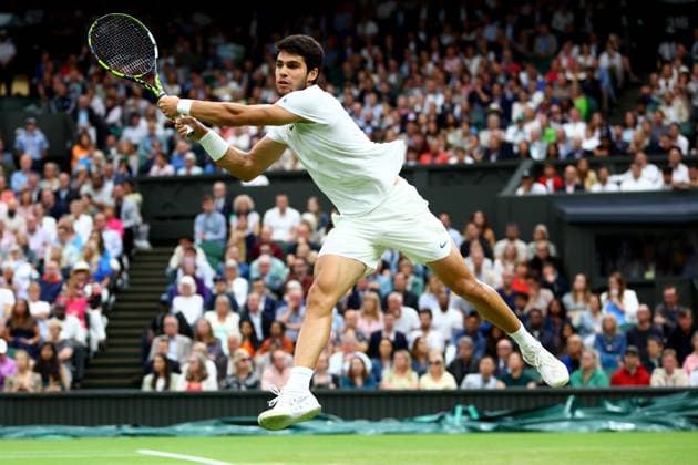 Mandatory Credit: Photo by Kieran McManus Shutterstock (14009604fl) Carlos Alcaraz of Spain in action during his Semi Final match. Wimbledon Tennis Championships, Day 12, The All England Lawn Tennis and Croquet Club, London, UK - 14 Jul 2023 Wimbledon Tennis Championships, Day 12, The All England Lawn Tennis and Croquet Club, London, UK - 14 Jul 2023  Copyright: xKieranxMcManus Shutterstockx 14009604fl