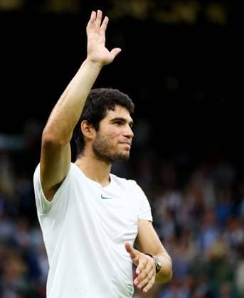 Mandatory Credit: Photo by Kieran McManus Shutterstock (14009604gc) Carlos Alcaraz of Spain celebrates winning his Semi Final match. Wimbledon Tennis Championships, Day 12, The All England Lawn Tennis and Croquet Club, London, UK - 14 Jul 2023 Wimbledon Tennis Championships, Day 12, The All England Lawn Tennis and Croquet Club, London, UK - 14 Jul 2023  Copyright: xKieranxMcManus Shutterstockx 14009604gc