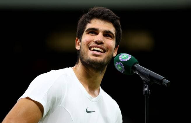 Mandatory Credit: Photo by Kieran McManus Shutterstock (14009604gb) Carlos Alcaraz of Spain speaks after winning his Semi Final match. Wimbledon Tennis Championships, Day 12, The All England Lawn Tennis and Croquet Club, London, UK - 14 Jul 2023 Wimbledon Tennis Championships, Day 12, The All England Lawn Tennis and Croquet Club, London, UK - 14 Jul 2023  Copyright: xKieranxMcManus Shutterstockx 14009604gb