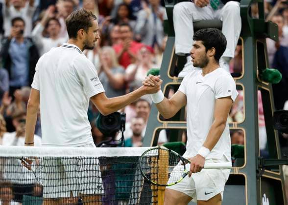 Daniil Medvedev congratulates the winner Carlos Alcaraz ESP cheers after the victory, jubilation, joy, emotion Tennis Wimbledon 2023 Grand Slam ITF ATP WTA AELTC London Great Britain 14 July 2023 Copyright: xJuergenxHasenkopfx