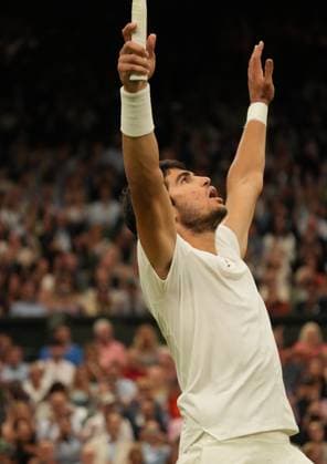 Tennis - 2023 Wimbledon Championships - Week Two - Day Twelve - All England lawn Tennis & Racquet Club, Wimbledon - Friday 14th Mens Semi final - Carlos Alcaraz (ESP) v Danill Medvedev Carlos Alcaraz celebrates winning match point 