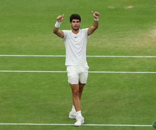 14th July 2023; All England Lawn Tennis and Croquet Club, London, England: Wimbledon Tennis Tournament; Carlos Alcaraz (ESP) gives the thumbs up to the crowd after defeating Daniil Medvedev (RUS) in three sets to reach the final against Novak Djokovic (SRB)  ActionPlus12531292 JohnxPatrickxFletcher