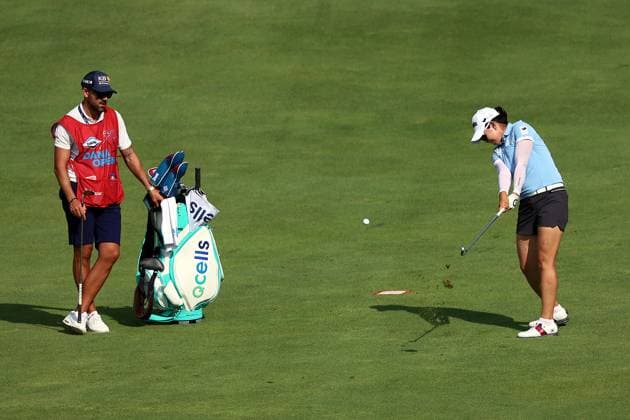 DANA Open A Lim Kim of Kimpo, Republic of Korea hits from the 18th fairway to the green as her caddy looks on during the second round of the Dana Open golf tournament at Highland Meadows Golf Club in Sylvania, Ohio USA, on Friday, July 14, 2023. Sylvania Ohio United States  Copyright: xAmyxLemusx originalFilename:lemus-danaopen230714_np9V3.jpg